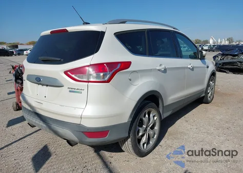 2015 Ford Escape Titanium z USA, uszkodzony, nr VIN 1FMCU0J95FUB14099